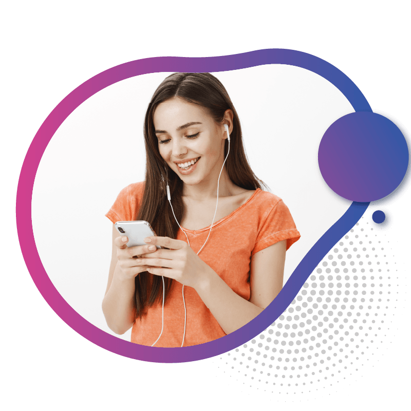 A girl in an orange shirt holds a smartphone and listens to music through earphones, symbolizing smart, hassle-free connectivity with eSIM technology in Australia
